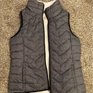 Cute black and white, fluffy inside, vest.